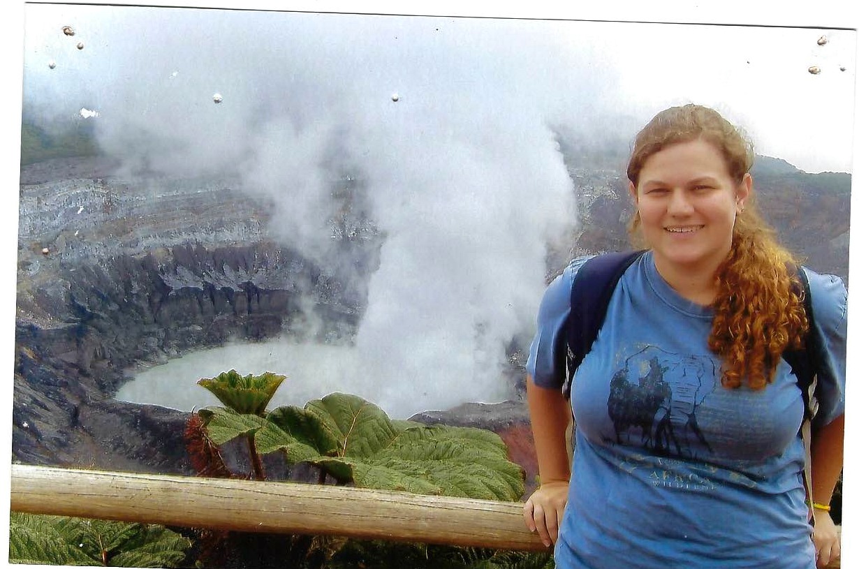 Diane standing at a dramatic natural overlook