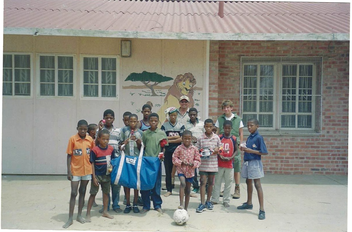 Children gathered outside a rural school